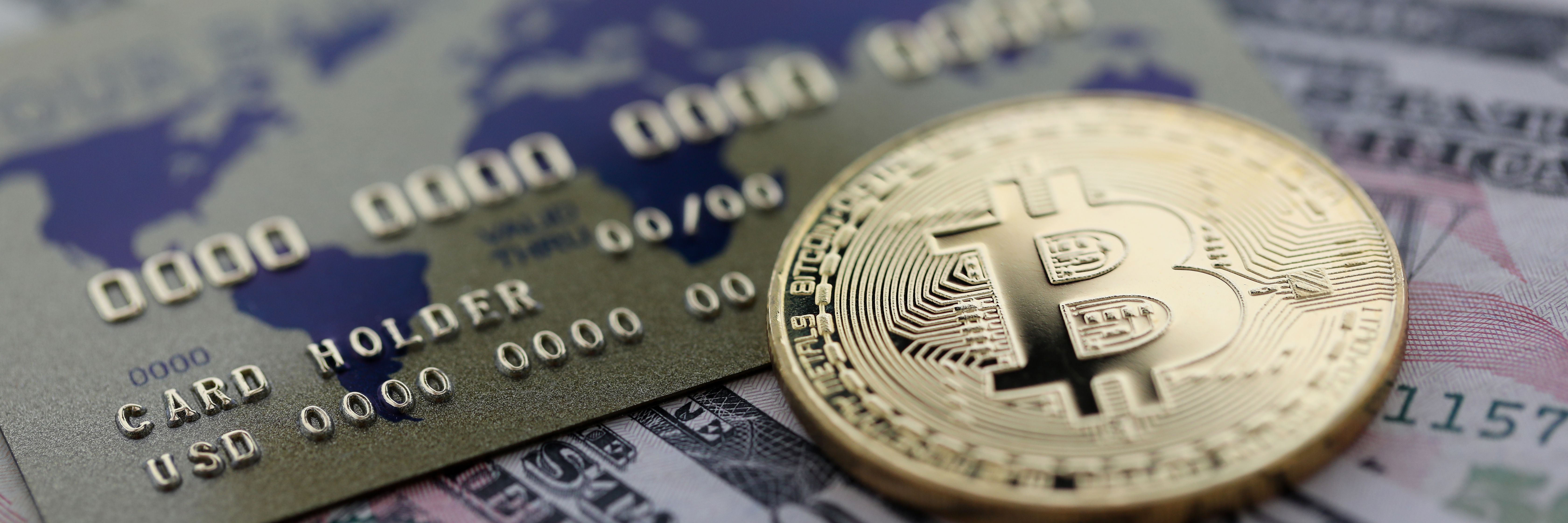 gold-coin-bitcoin-closeup-lie-table.jpg
