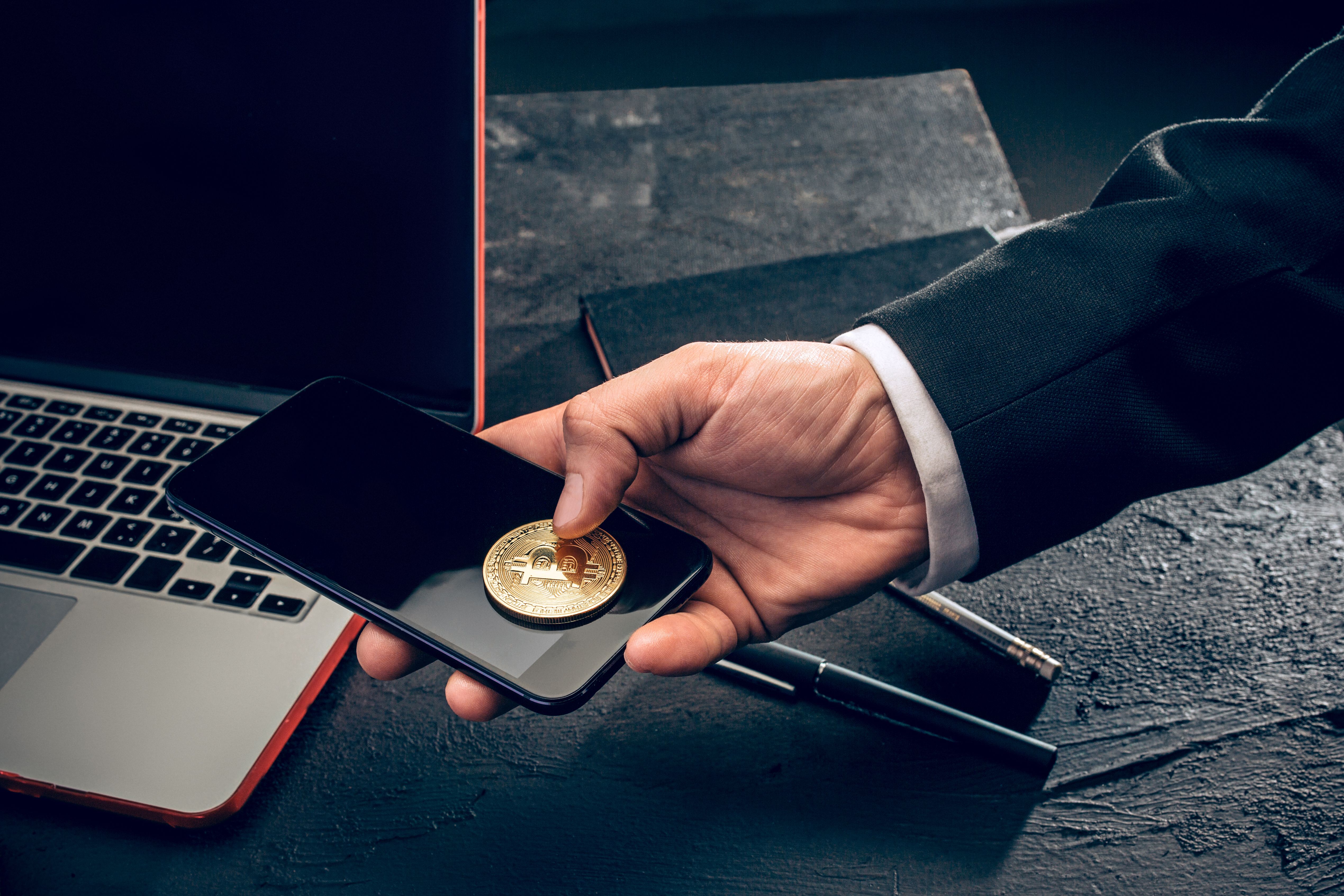 golden-bitcoin-mail-hands.jpg